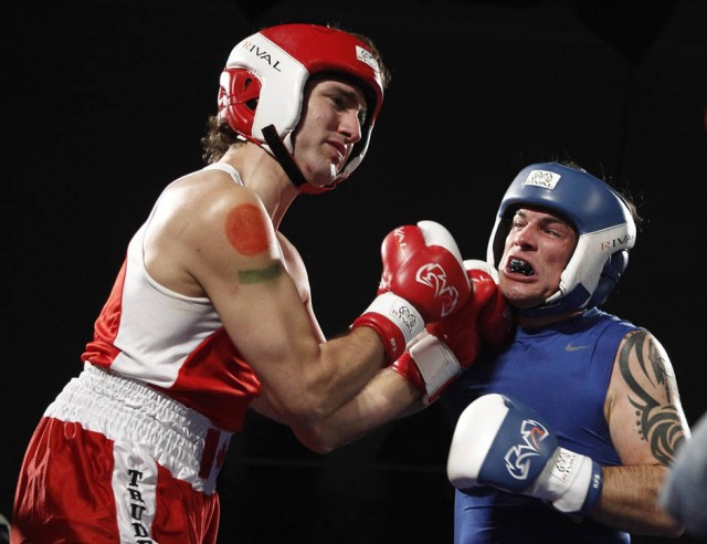 Liberal MP Trudeau and Conservative Senator Brazeau fight during their charity boxing match in Ottawa